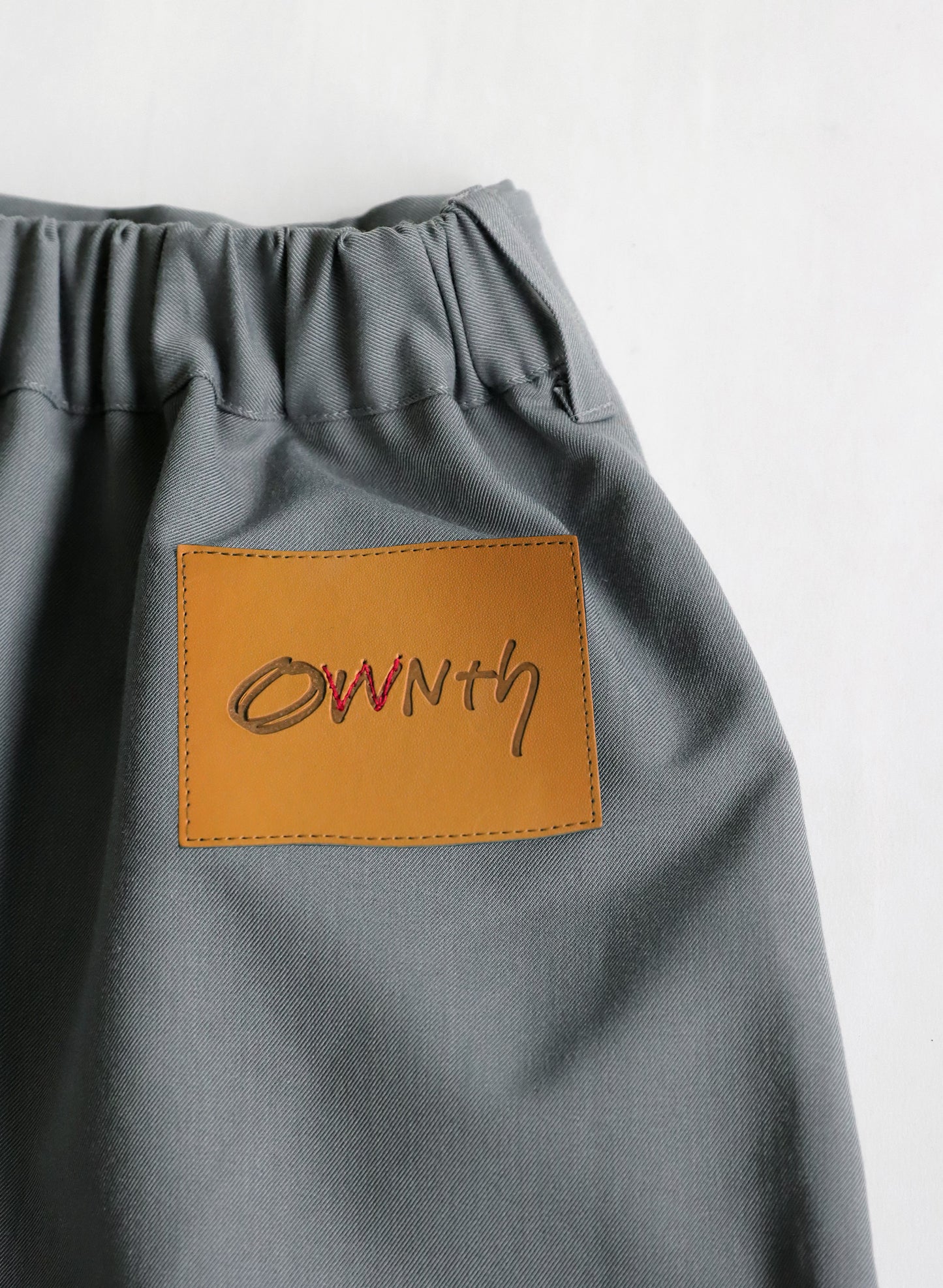 OWNth(オンス) レイヤードデザインスカート きれいめ レディース ロゴ